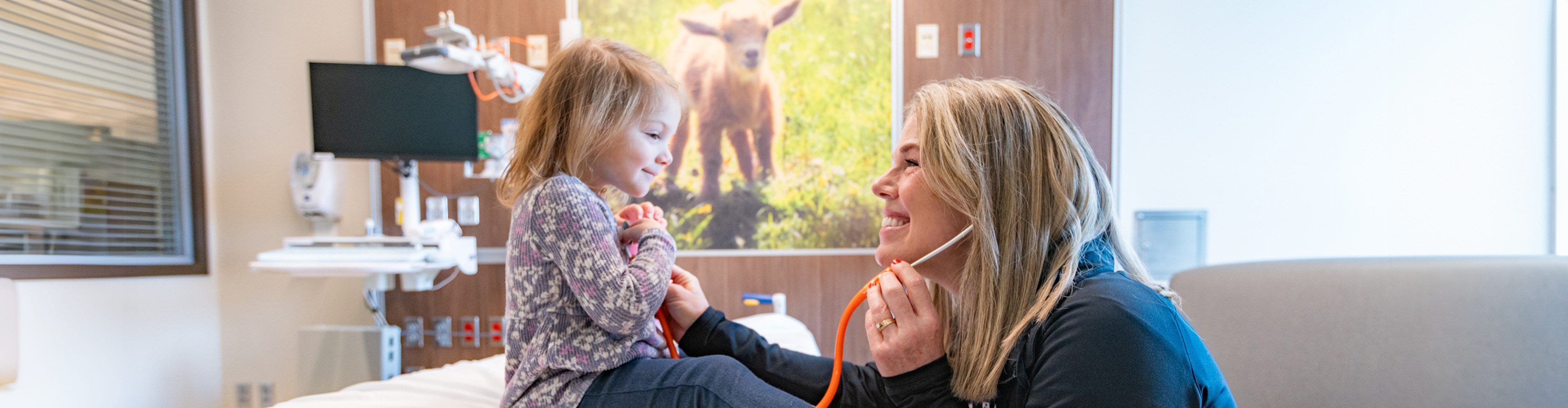 Pediatrics patient in room with provider at Asante Rogue Regional Medical Center